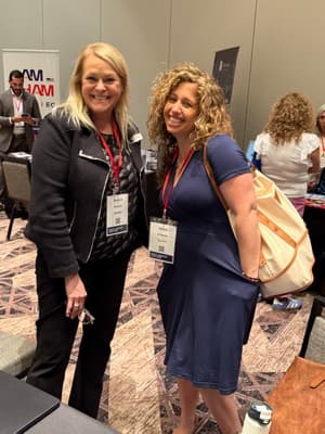 LGBTQ+ couple embracing